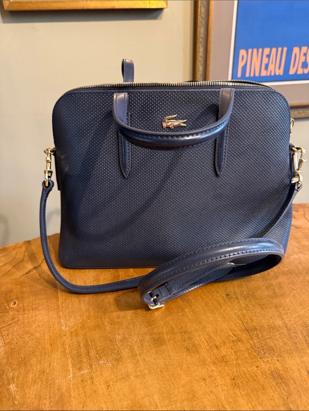 Lacoste Navy Textured Leather Messenger Bag with Gold Logo